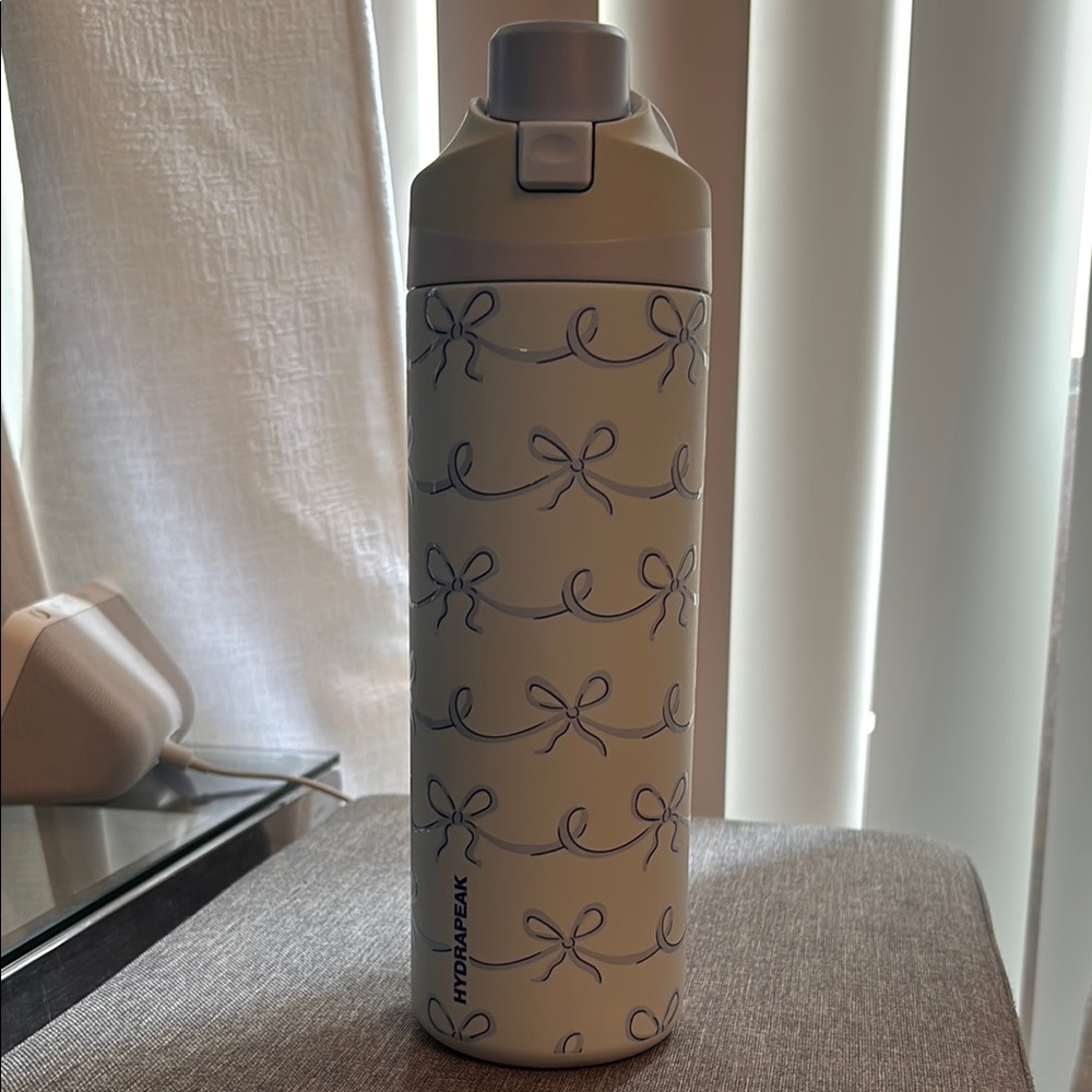 Cream Water Bottle with Bow Design